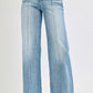 Women's light wash mid rise jeans with seam down the middle