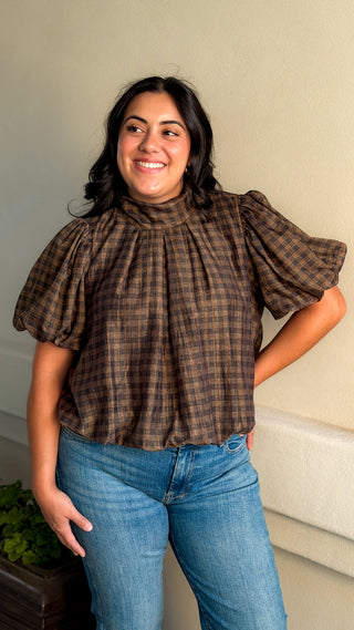 Women's brown and black plaid puff sleeve top with high neckline