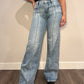 Women's mid rise jeans with seam down the middle