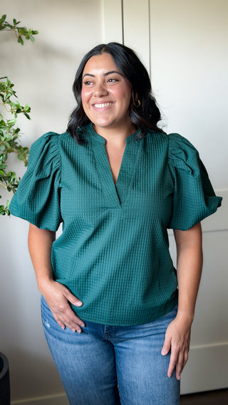 Women's green textured V-neck puff sleeve top with short sleeves