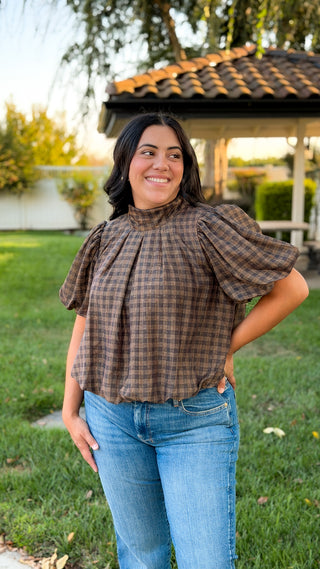 Women's brown and black plaid puff sleeve top with high neckline