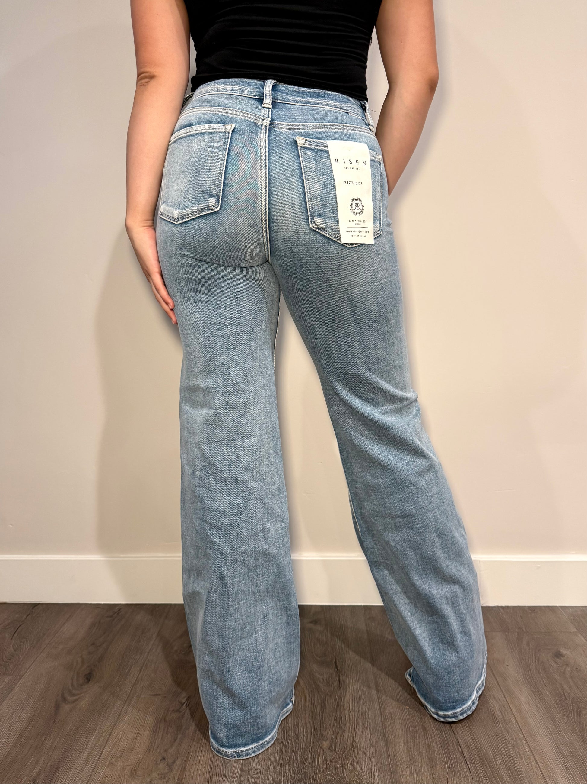 Women's mid rise jeans with seam down the middle