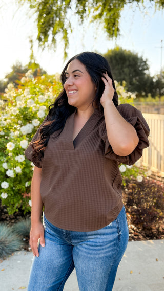 Women's brown textured V-neck puff sleeve top with short sleeves