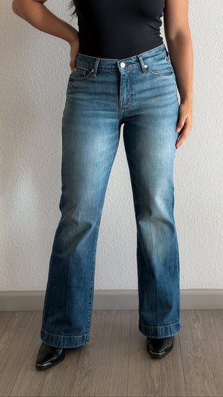 Front view of the 7 For All Mankind Tailorless Dojo women's flare jeans in Bluefern, a mid-rise medium blue wash with a wide flared leg, short inseam