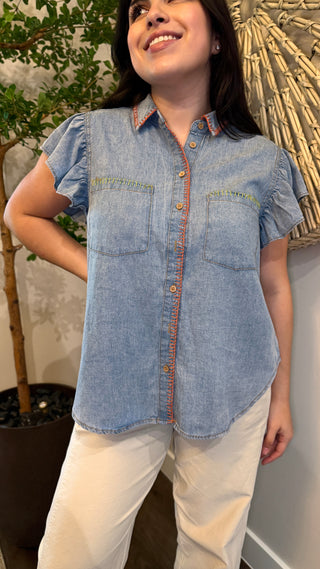 Woman wearing a denim shirt 