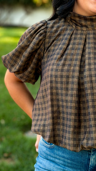 Women's brown and black plaid puff sleeve top with high neckline