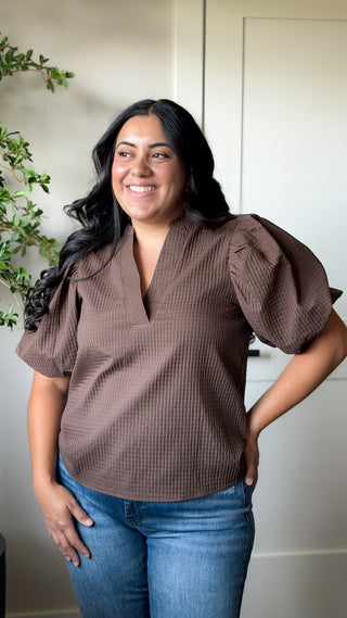 Women's brown textured V-neck puff sleeve top with short sleeves