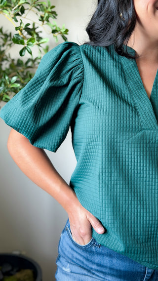 Women's green textured V-neck puff sleeve top with short sleeves