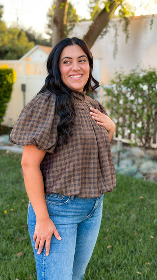Women's brown and black plaid puff sleeve top with high neckline