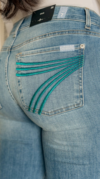 7 For All Mankind Dojo Aquamarine jeans with turquoise stitched 7, medium-light blue wash, 9.5-inch mid-rise and 34-inch inseam