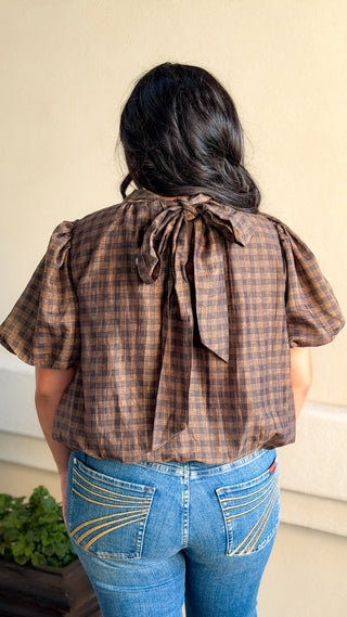 Women's brown and black plaid puff sleeve top with high neckline